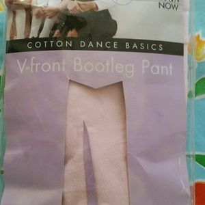New in pkg.  Danskin Now bootleg pink dance pants